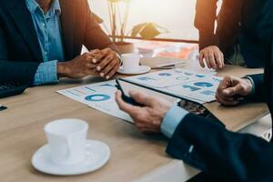 Entrepreneurs and business people conference in modern meeting room, happy multiracial coworkers have fun cooperating working together at office meeting, asian teamwork concept photo