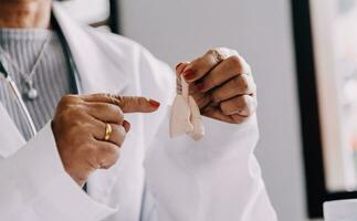 Female doctor holding virtual Lungs in hand. Handrawn human organ, copy space on right side, raw photo colors. Healthcare hospital service concept stock photo