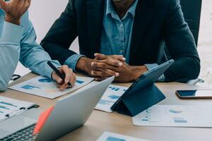 Entrepreneurs and business people conference in modern meeting room, happy multiracial coworkers have fun cooperating working together at office meeting, asian teamwork concept photo