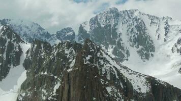 Tian Shan Snow-Capped Mountains. Drone is Orbiting Counterclockwise video