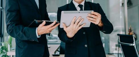 Entrepreneurs and business people conference in modern meeting room, happy multiracial coworkers have fun cooperating working together at office meeting, asian teamwork concept photo