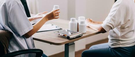 Pharmacist explaining prescription medication to woman in the pharmacy for pharmaceutical healthcare treatment. Medical, counter and female chemist talking to patient on medicine in clinic dispensary photo