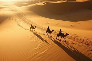 People on camels move through the desert. Beautiful desert landscape, top view. Generated by artificial intelligence photo