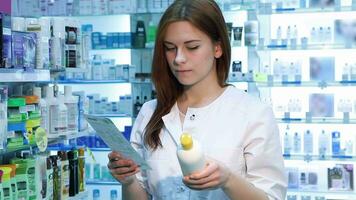 Pharmacist woman standing with recipe video