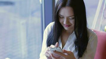 A young attractive woman with a coffee video