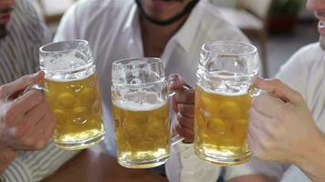 Top view of three young men with beer video