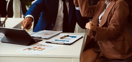 Team of business people working together in the meeting room office, teamwork background charts and graphs banner, double exposure successful teamwork,business planning concept. photo