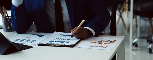 Team of business people working together in the meeting room office, teamwork background charts and graphs banner, double exposure successful teamwork,business planning concept. photo