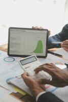 Team of business people working together in the meeting room office, teamwork background charts and graphs banner, double exposure successful teamwork,business planning concept. photo