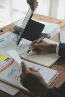 Team of business people working together in the meeting room office, teamwork background charts and graphs banner, double exposure successful teamwork,business planning concept. photo
