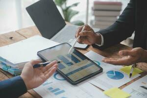 Team of business people working together in the meeting room office, teamwork background charts and graphs banner, double exposure successful teamwork,business planning concept. photo