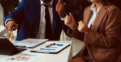 Team of business people working together in the meeting room office, teamwork background charts and graphs banner, double exposure successful teamwork,business planning concept. photo