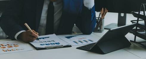 Team of business people working together in the meeting room office, teamwork background charts and graphs banner, double exposure successful teamwork,business planning concept. photo