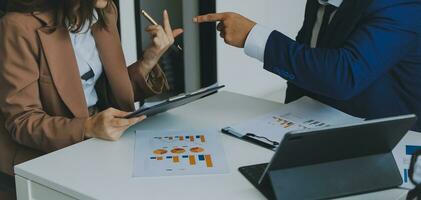 Team of business people working together in the meeting room office, teamwork background charts and graphs banner, double exposure successful teamwork,business planning concept. photo