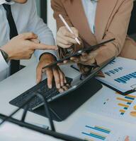 Team of business people working together in the meeting room office, teamwork background charts and graphs banner, double exposure successful teamwork,business planning concept. photo