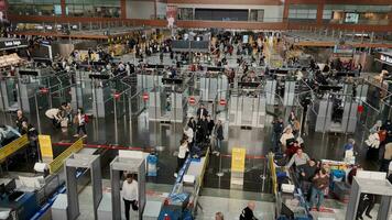 Turkey, Istanbul, 15 November 2022, Survey of passengers on control point at the airport, scanners of bags, people of security service video