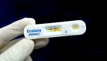 Rapid test for MDMA or Ecstasy Drug test, Alcohol addiction. photo
