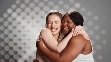 Diverse women smiling and posing on camera, creating campaign for body positivity and diversity. Beauty models with different skintones and body shapes promoting wellness and self acceptance. photo