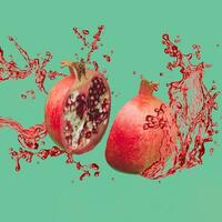 Slices of fresh and ripe pomegranate with splashing pomegranate juice thrown in the air, flying and levitating on a pastel green background. Trendy motion food composition. Creative fruit concept. photo