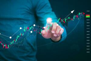 Planning and strategy, stock market, business growth, progress or success concept, businessman or trader showing growing virtual holographic stocks, invest in stock market trading or digital assets photo