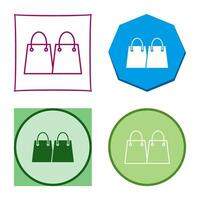 icono de vector de bolsas de compras únicas