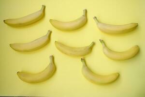 Fresh Banana on yellow background photo