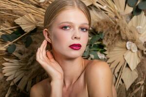 Closeup portrait of young beautiful woman with a healthy skin of the face. photo