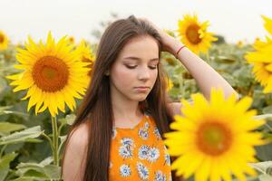 Young beautiful woman enjoying summer photo