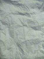 Fabric backdrop White linen canvas crumpled natural cotton fabric Natural handmade linen top view photo