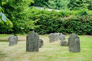 Old gravestones in the cemetery photo