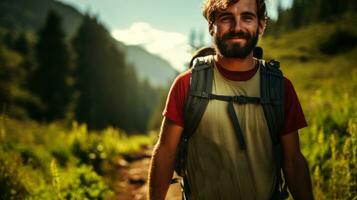 Hiking bearded man with backpack on the trail in the mountains. photo