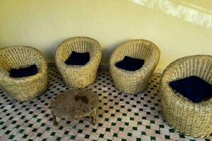 Woven wicker chairs photo