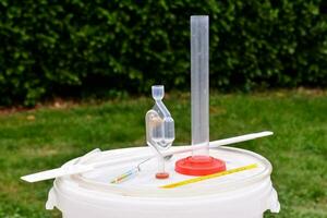 Beaker and instruments on table photo