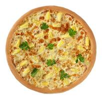 Hawaiian pizza with chicken, pineapple, cheese sauce and mozzarella sprinkled with sesame and greens photo