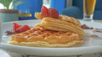 sweet waffle on white plate photo