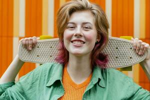 Female skateboarder portrait. photo