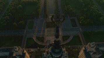 Moscow state university in the morning. Aerial view. Flying backward over the star. Cityscape reveal, camera tilt. video