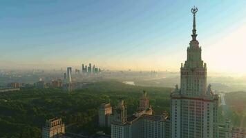 Flying over Moscow state university main campus at sunny morning. Moscow cityscape view. Russia. Aerial View. video