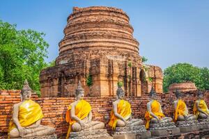 Buddhas at the temple of Wat Yai Chai Mongkol in Ayutthaya,Thailand photo