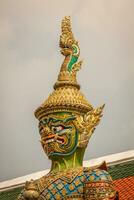 Statue in Wat Phra Kaew at Bangkok Thailand photo