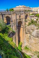 Bridge of Ronda, one of the most famous white villages of Malaga, Andalusia, Spain photo