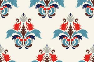 ikat floral cachemir bordado en blanco fondo.ikat étnico oriental sin costura modelo tradicional.azteca estilo resumen vector ilustración.diseño para textura, tela, envoltura, ropa, decoración.