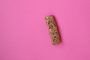 One piece gluten free granola cereal snack, seed, protein energy bar photo