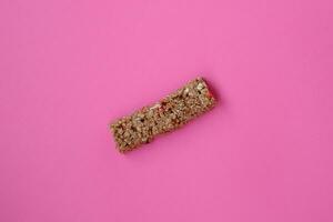 One piece gluten free granola cereal snack, seed, protein energy bar photo