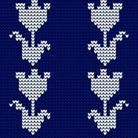 Seamless knitted pattern with flowers. Vector illustration. Blue background.
