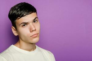 Indoor shot of handsome muscular guy with positive expression photo