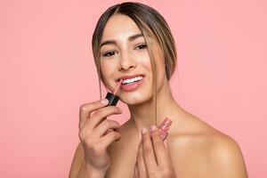 Sexy woman lips with pink makeup and gloss photo