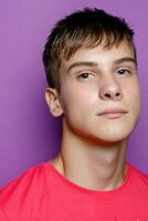 Indoor shot of handsome muscular guy with positive expression photo