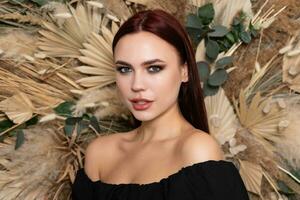 Closeup portrait of young beautiful woman with a healthy skin of the face. photo