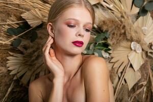 Closeup portrait of young beautiful woman with a healthy skin of the face. photo